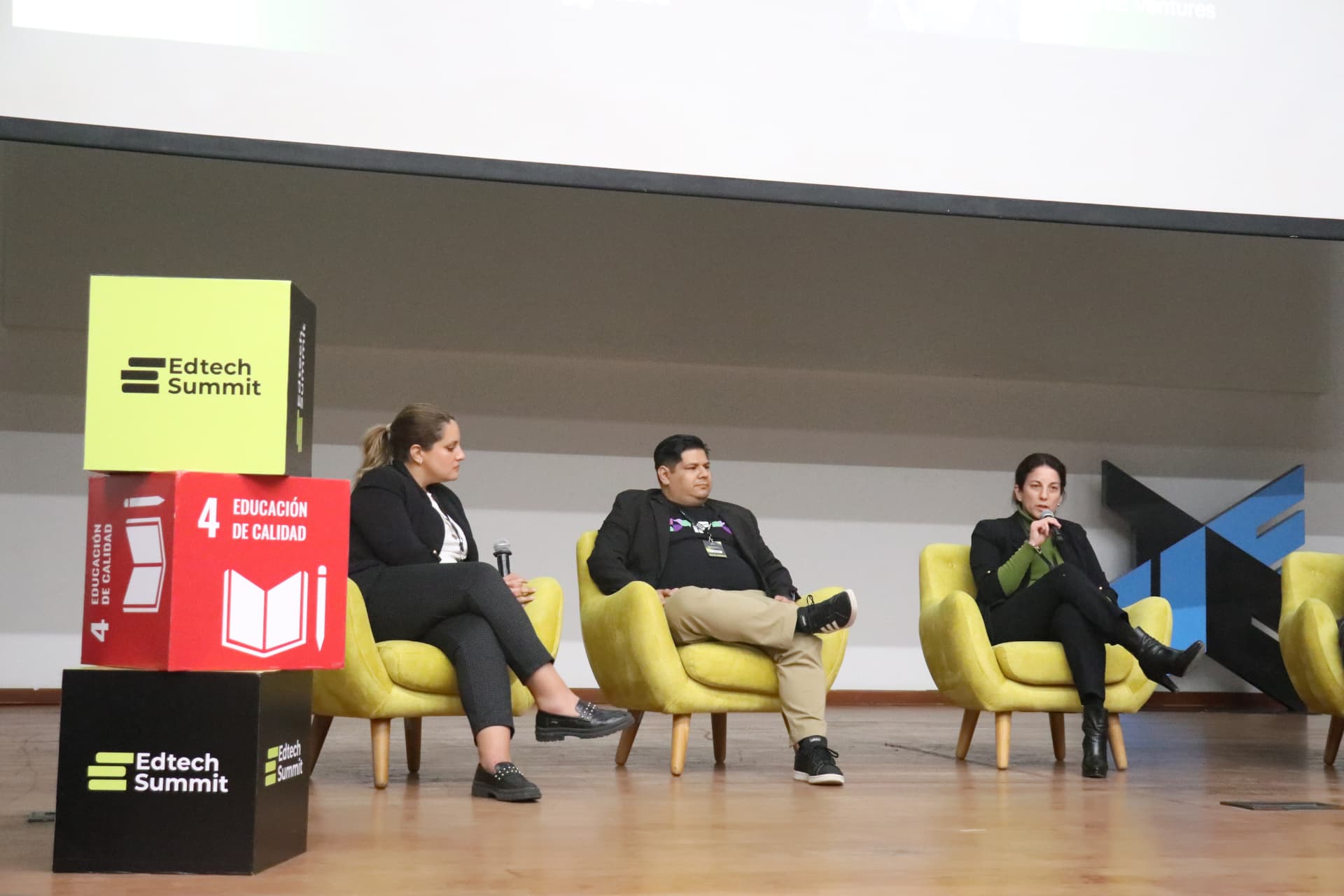 Panelists during a summit conversation